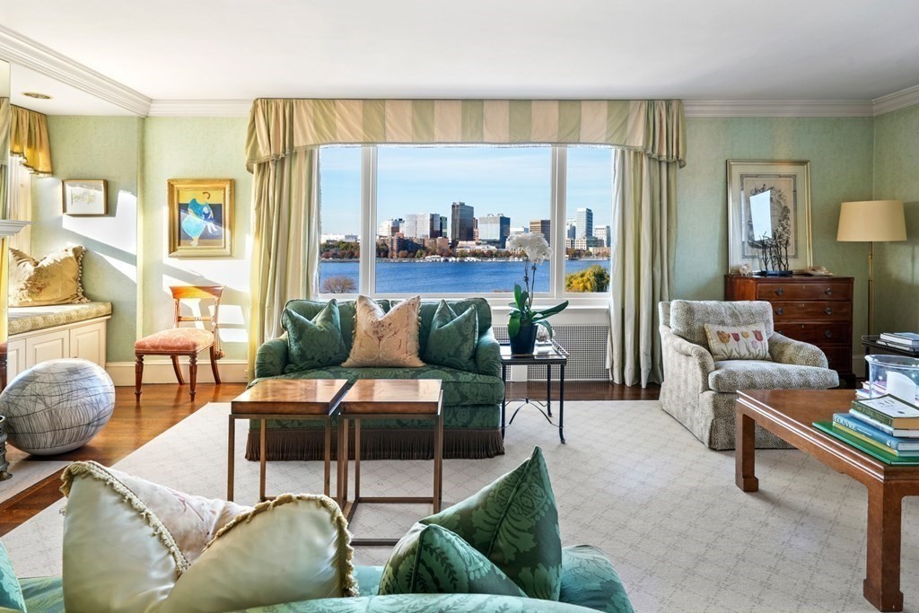 282 Beacon Street, Unit 6 Boston, MA 02116 - Photo 2 of 26 a living room with furniture and a large window