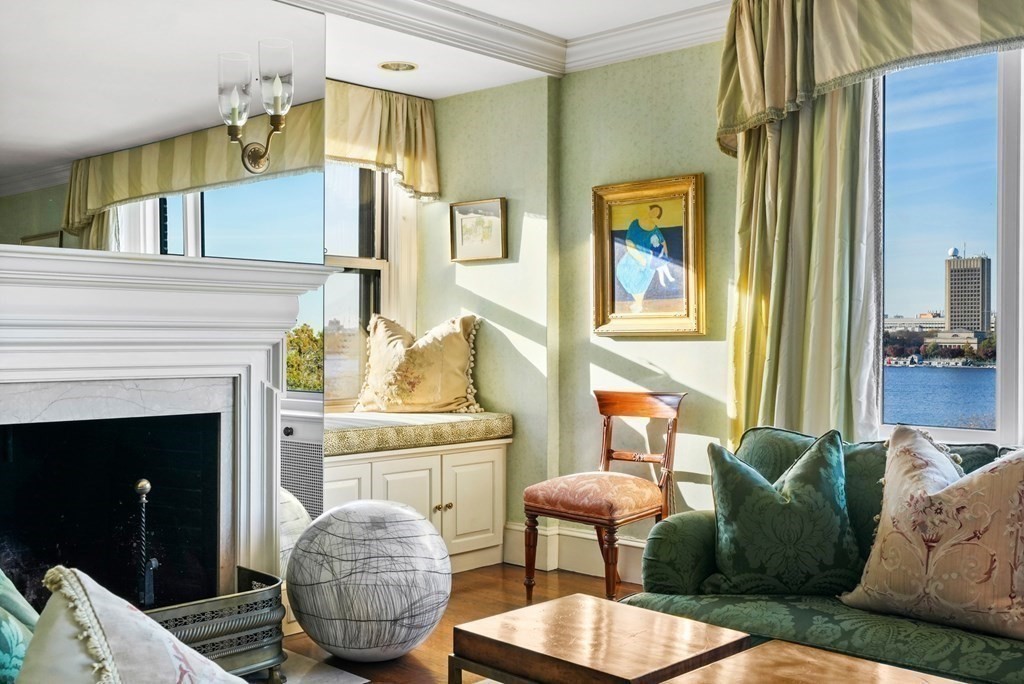 282 Beacon Street, Unit 6 Boston, MA 02116 - Photo 4 of 26 a living room with furniture and a fireplace