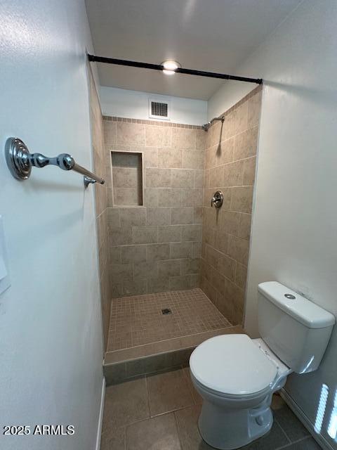 1025 West 12th Place Tempe, AZ 85281 - Photo 23 of 25 a bathroom with a toilet and a shower