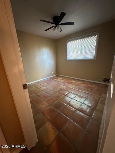 1025 West 12th Place Tempe, AZ 85281 - Photo 25 of 25 a view of a livingroom with a ceiling fan and window