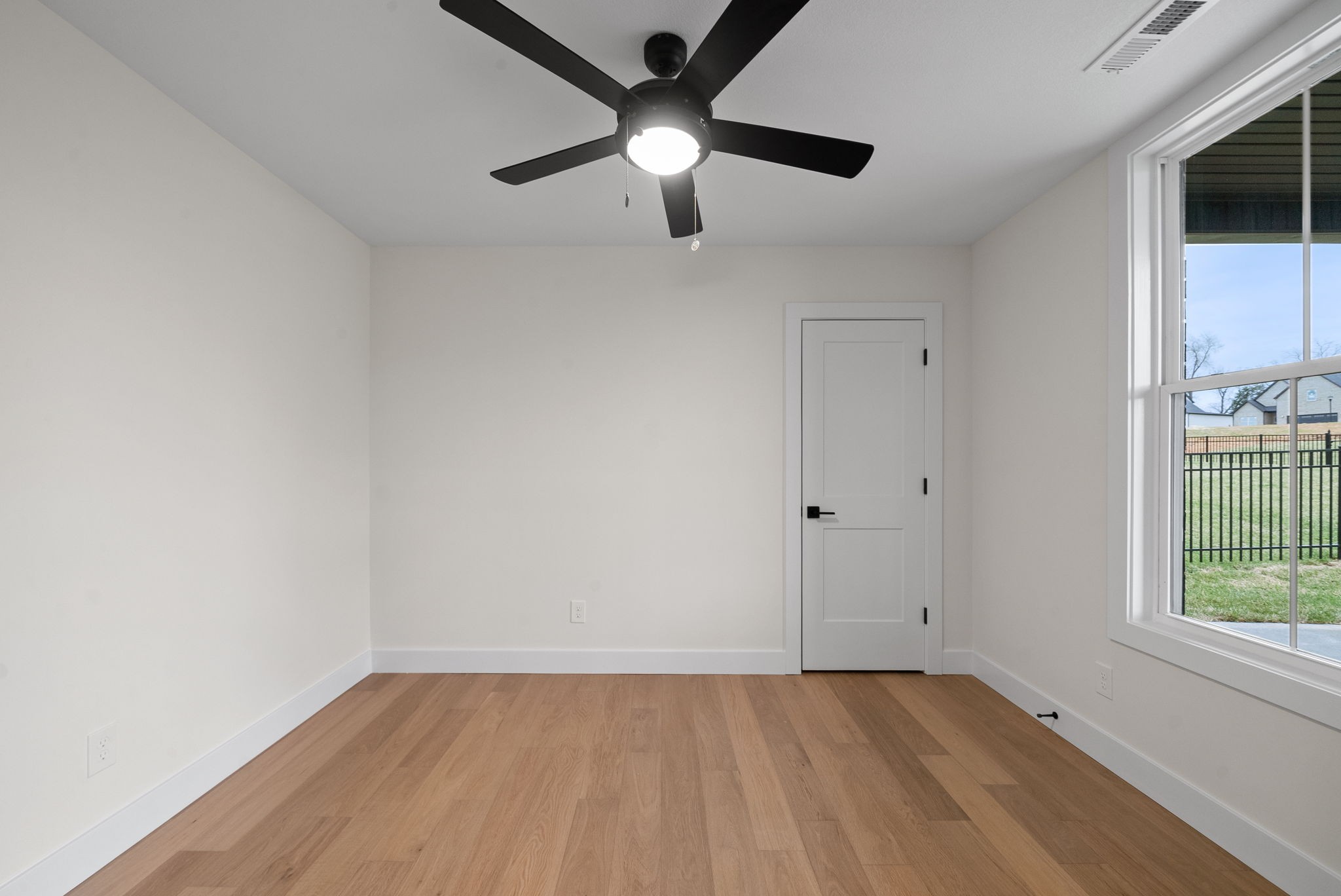 15 Rustling Oaks Court Pleasant View, TN 37146 - Photo 21 of 50 wooden floor in an empty room with a window