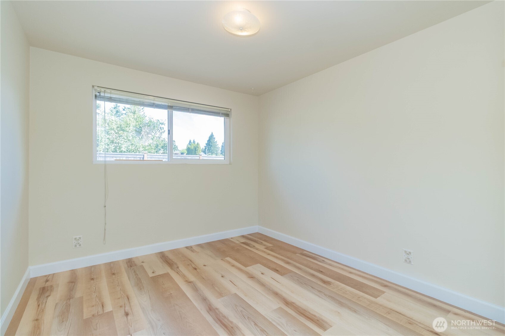 16958 121st Avenue Southeast Renton, WA 98058 - Photo 17 of 34 an empty room with a window
