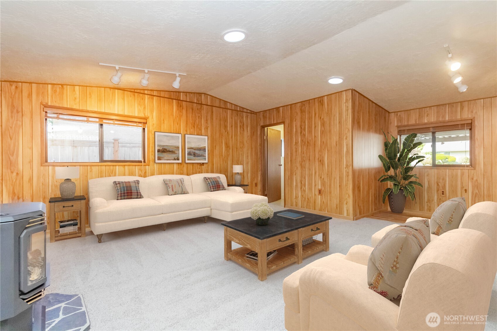 16958 121st Avenue Southeast Renton, WA 98058 - Photo 24 of 34 a living room with furniture and a large window