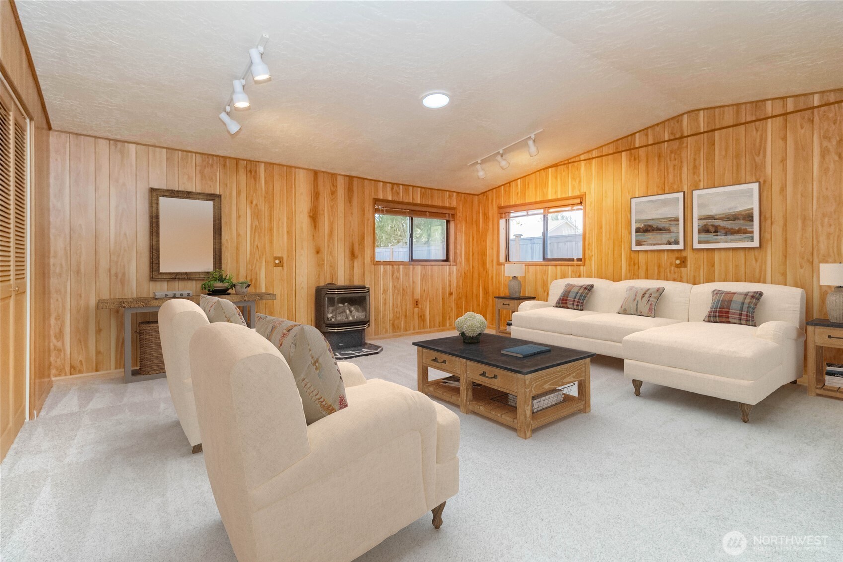 16958 121st Avenue Southeast Renton, WA 98058 - Photo 25 of 34 a living room with furniture and a large window