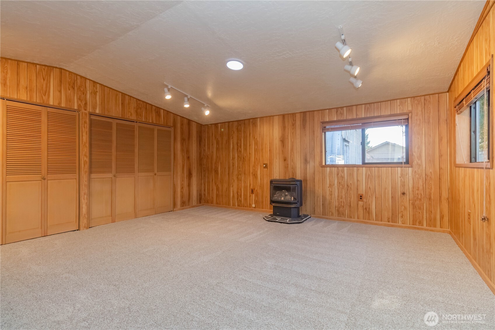 16958 121st Avenue Southeast Renton, WA 98058 - Photo 27 of 34 an empty room with windows
