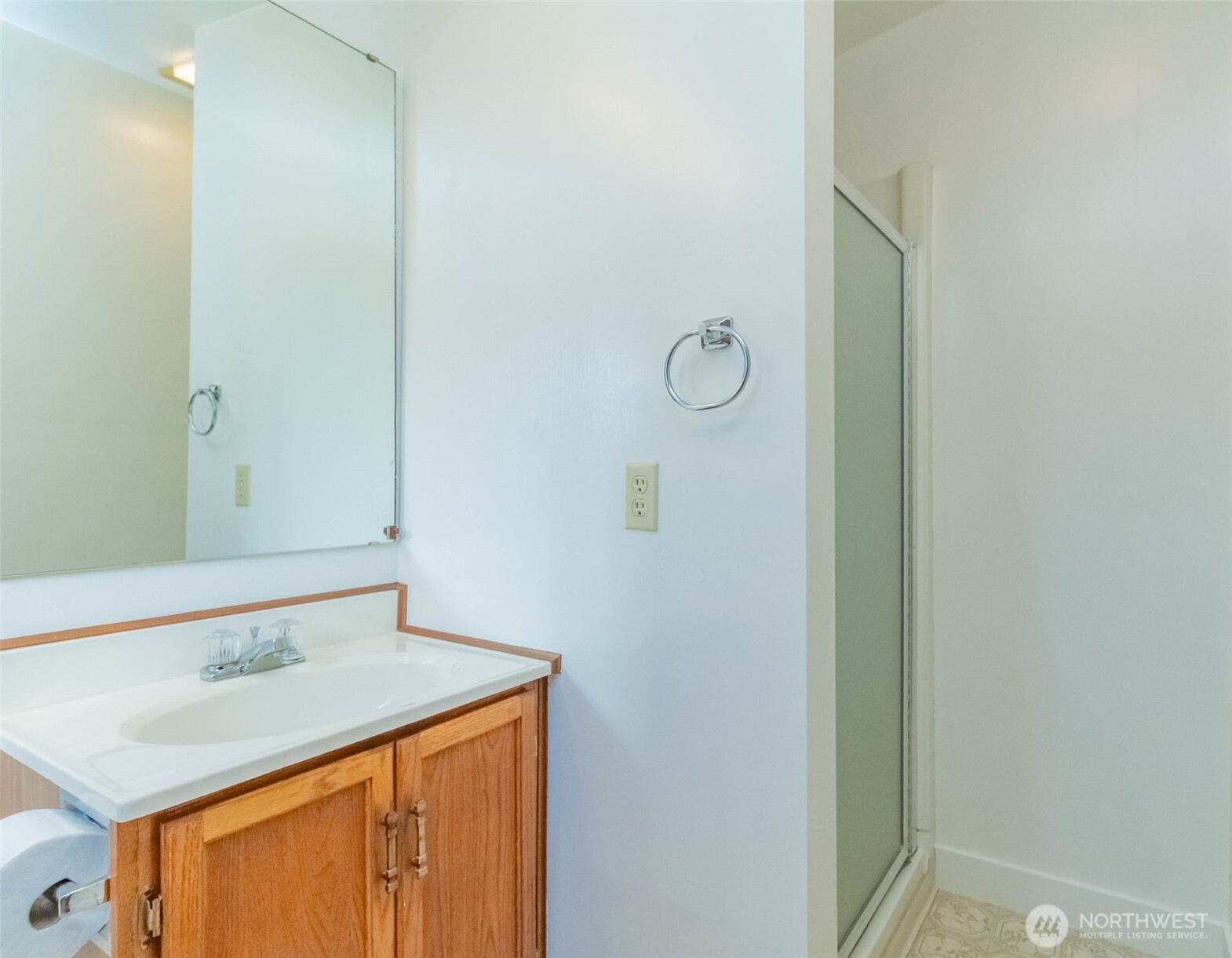 16958 121st Avenue Southeast Renton, WA 98058 - Photo 30 of 34 a bathroom with a sink and a mirror