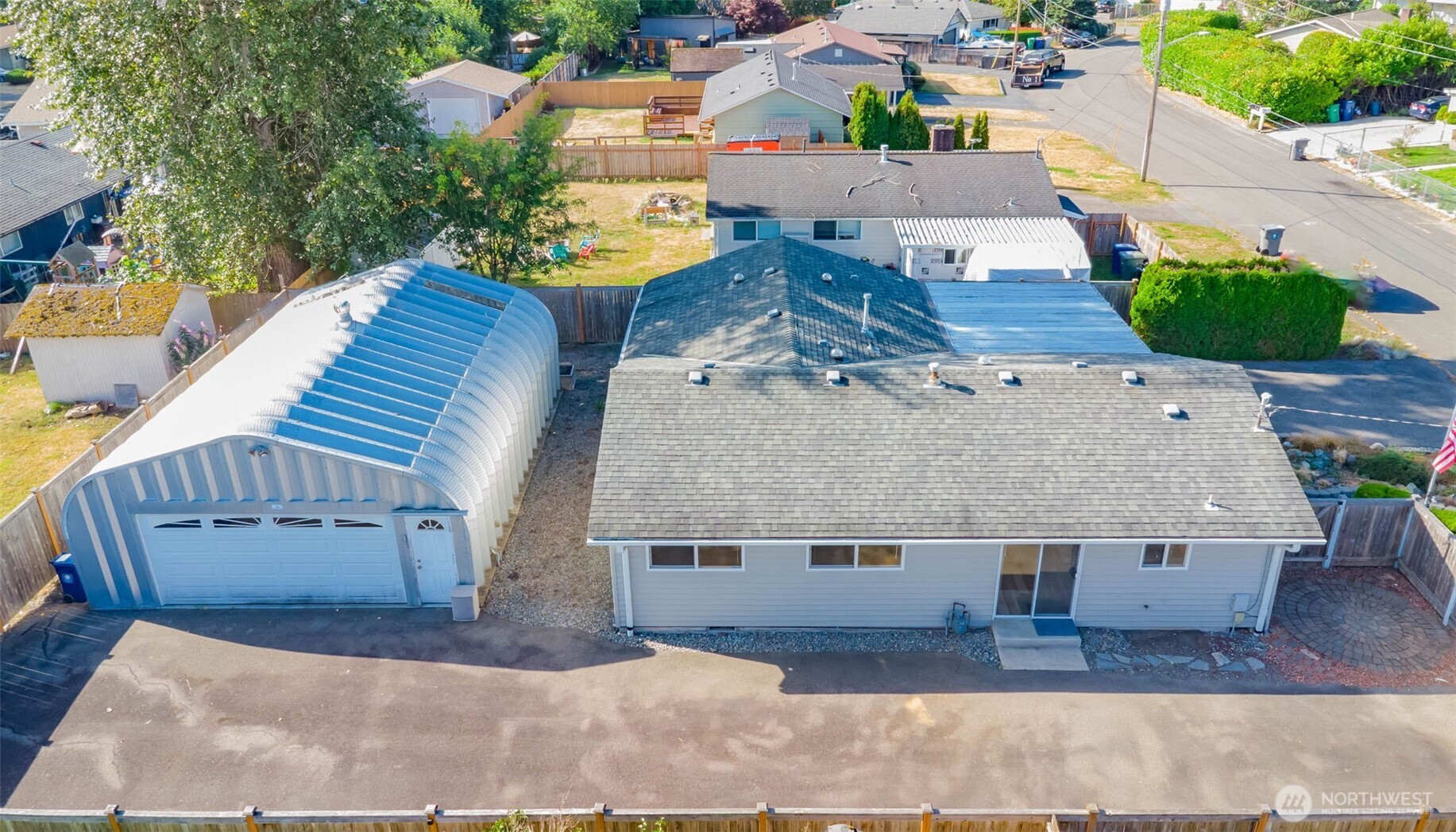 16958 121st Avenue Southeast Renton, WA 98058 - Photo 4 of 34 an aerial view of a house with swimming pool and porch