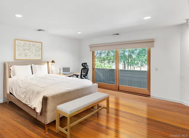 a front view of a house with a yard table and chairs