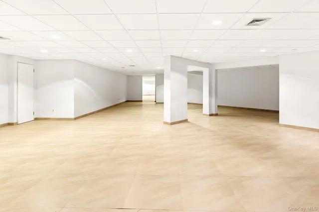 an aerial view of residential house with outdoor space and swimming pool