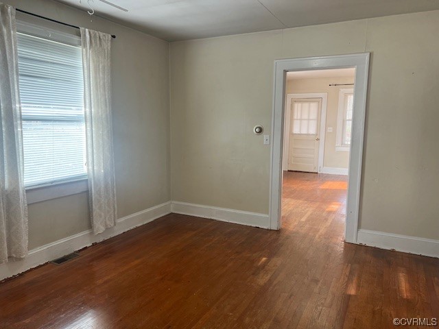 89 Mohawk Road Buckingham, VA 23921 - Photo 8 of 15 an empty room with wooden floor closet and windows