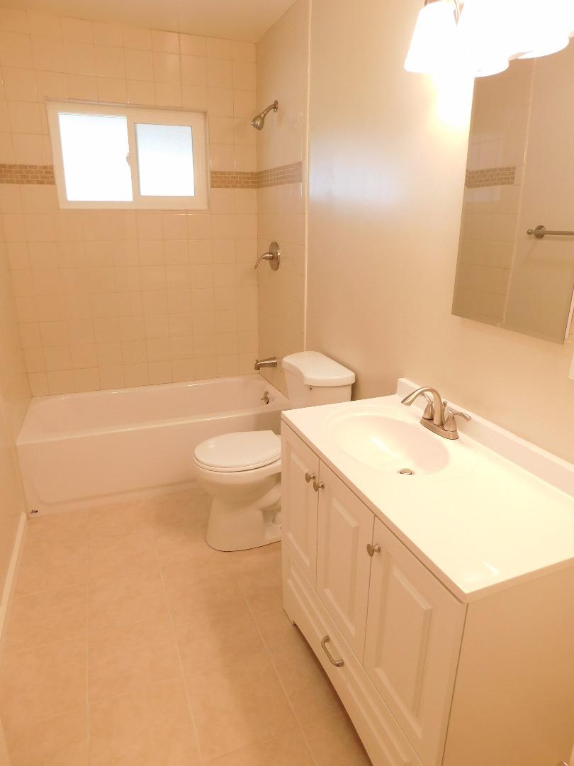 158 Dutchman Road Watsonville, CA 95076 - Photo 5 of 15 a bathroom with a sink a toilet and shower