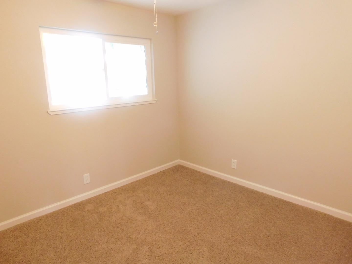 158 Dutchman Road Watsonville, CA 95076 - Photo 6 of 15 an empty room with a window