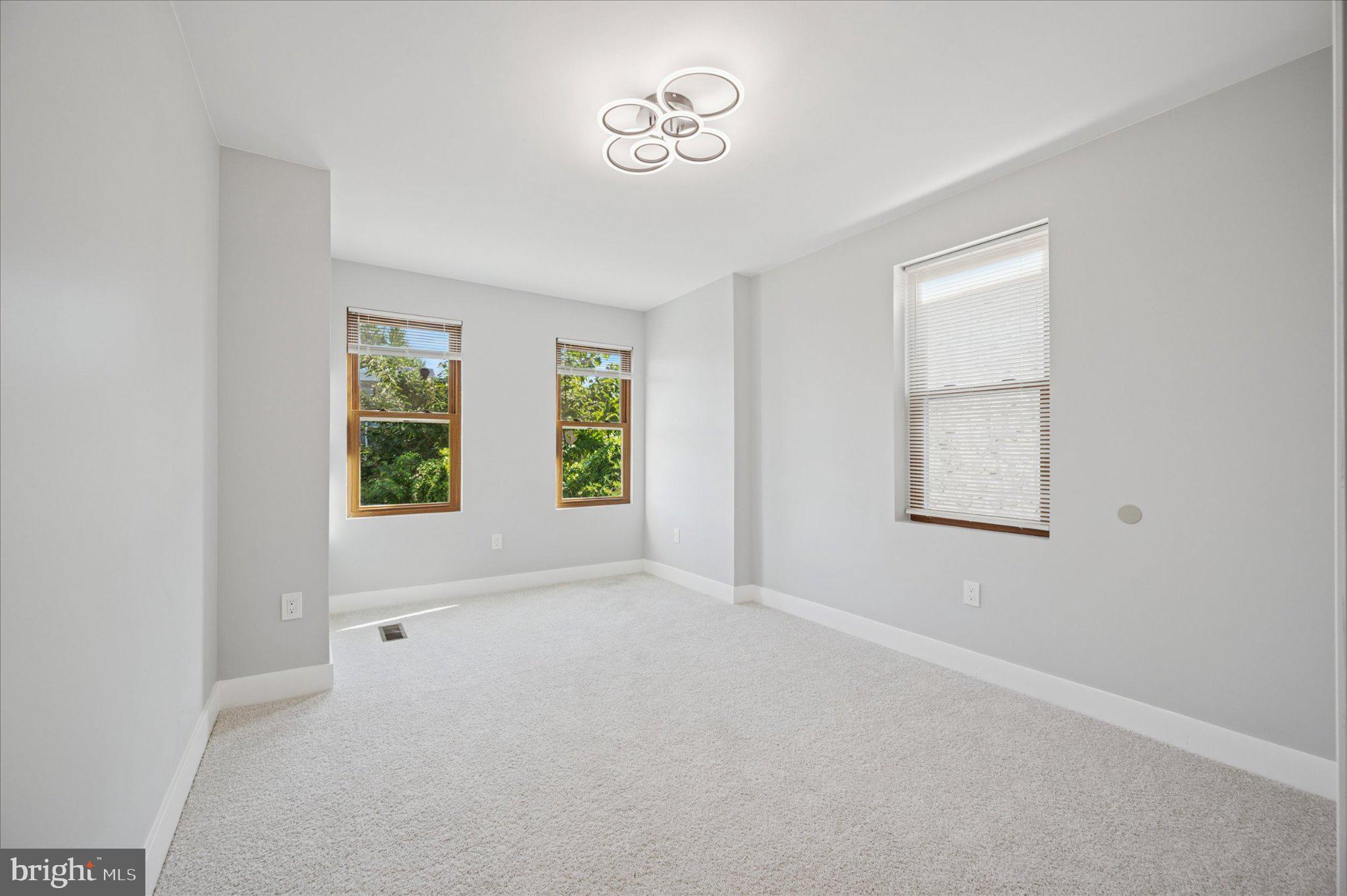 3026 Page Street Philadelphia, PA 19121 - Photo 12 of 24 an empty room with windows