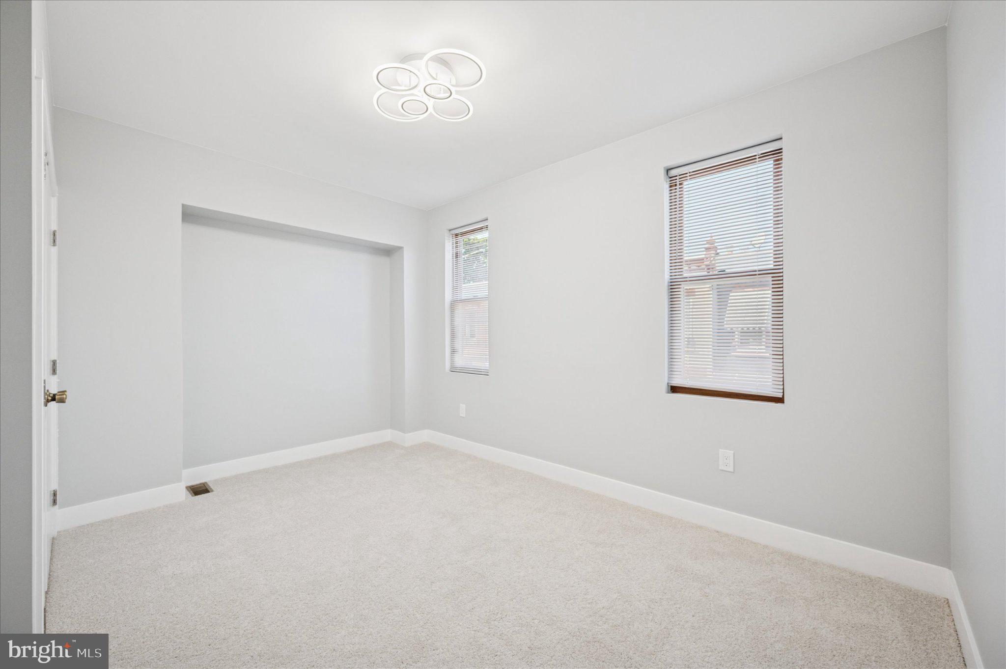 3026 Page Street Philadelphia, PA 19121 - Photo 19 of 24 an empty room with a window