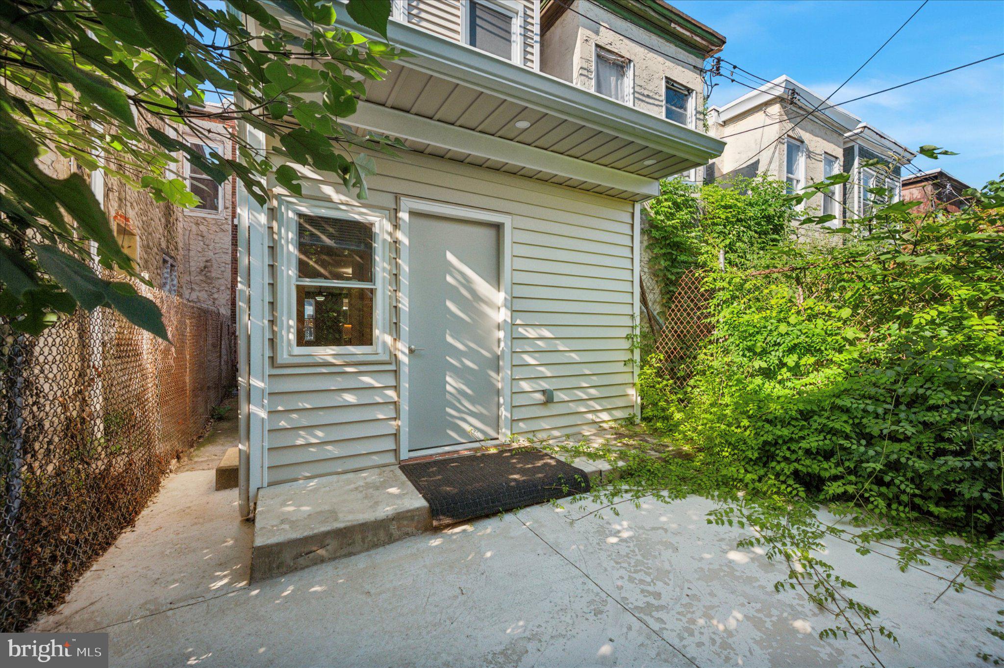 3026 Page Street Philadelphia, PA 19121 - Photo 23 of 24 a view of a house with a street