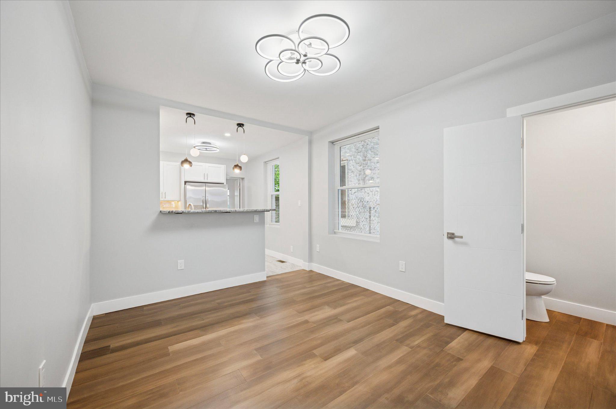 3026 Page Street Philadelphia, PA 19121 - Photo 7 of 24 a view of a room with wooden floor and window