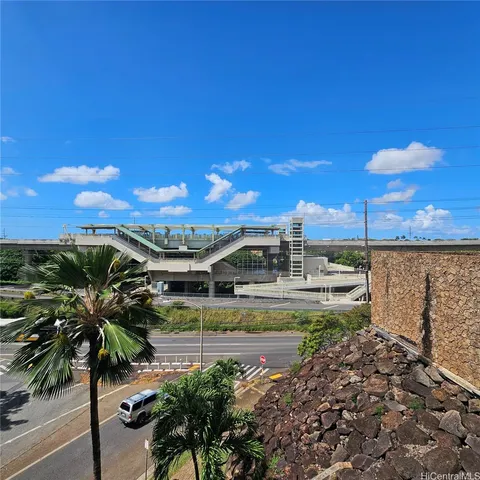 a view of a swimming pool with a yard