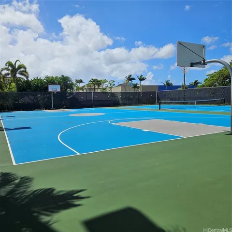 a kitchen with stainless steel appliances a refrigerator stove and microwave