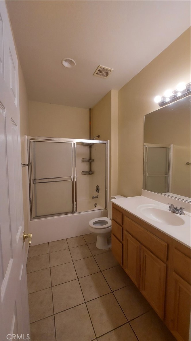 16124 Holly Ridge Court Victorville, CA 92395 - Photo 14 of 24 a spacious bathroom with a shower and a sink