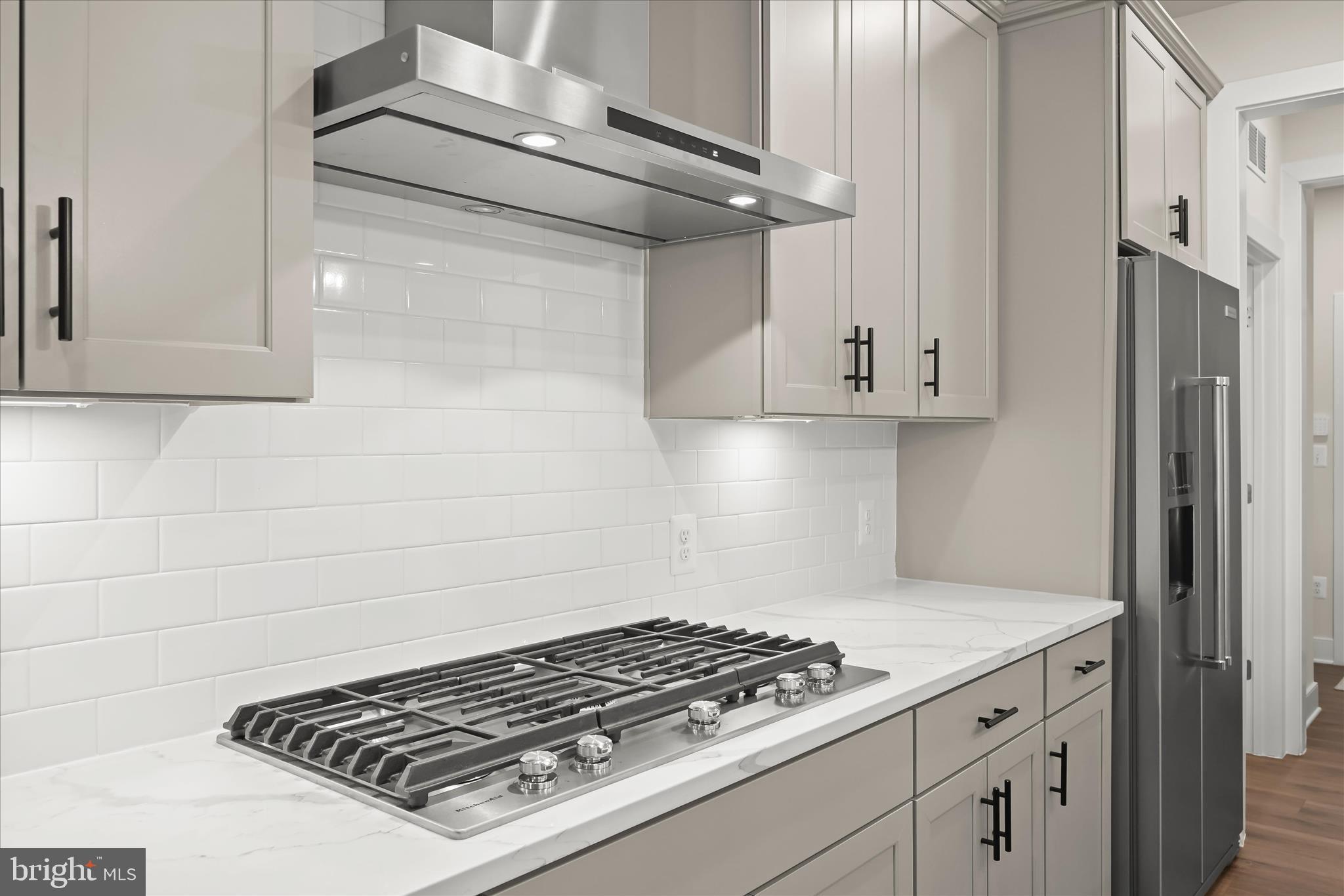 8104 Lisa Lane Fulton, MD 20759 - Photo 16 of 54 a stove top oven sitting inside of a kitchen