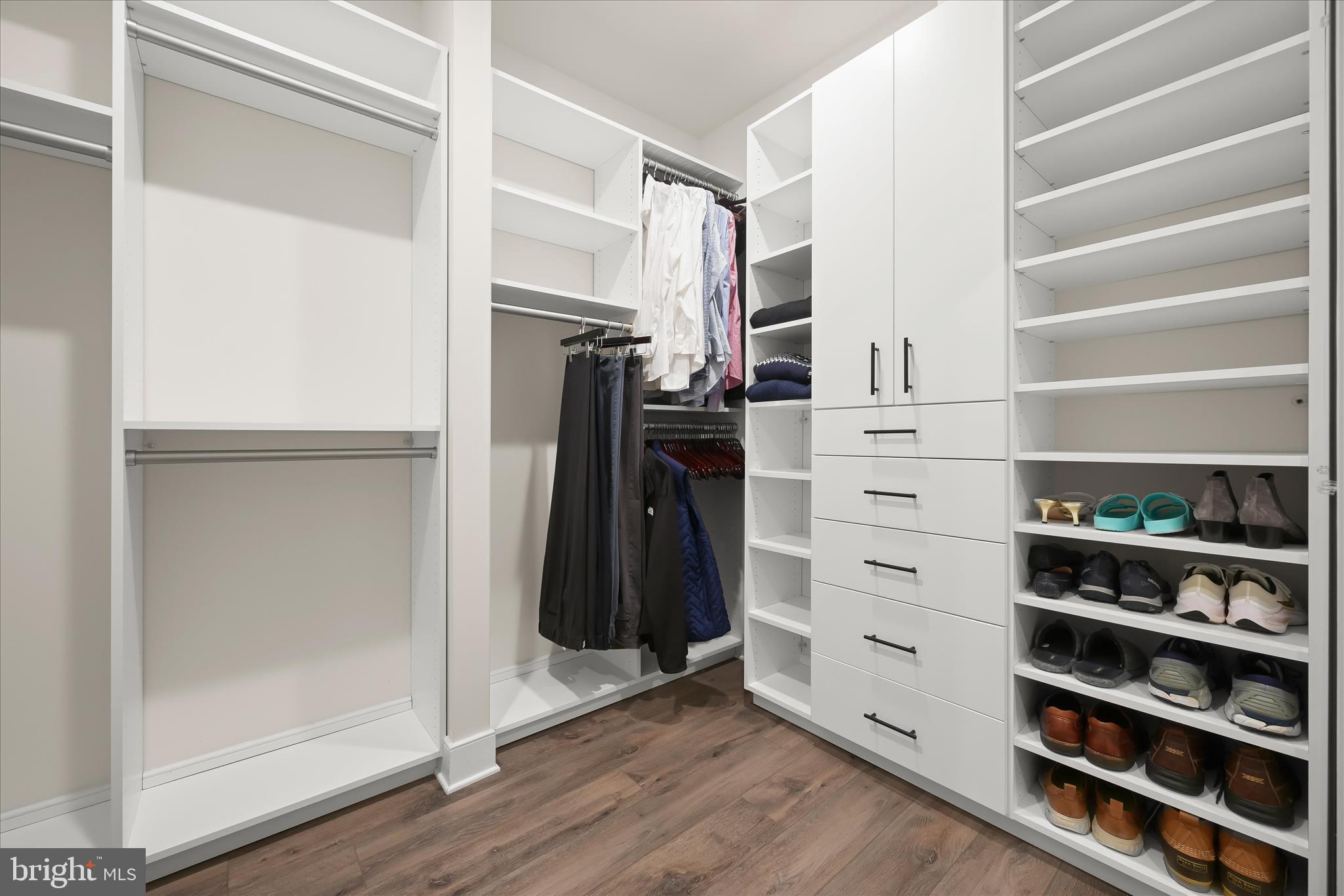 8104 Lisa Lane Fulton, MD 20759 - Photo 22 of 54 a view of walk in closet with clothes and shoes