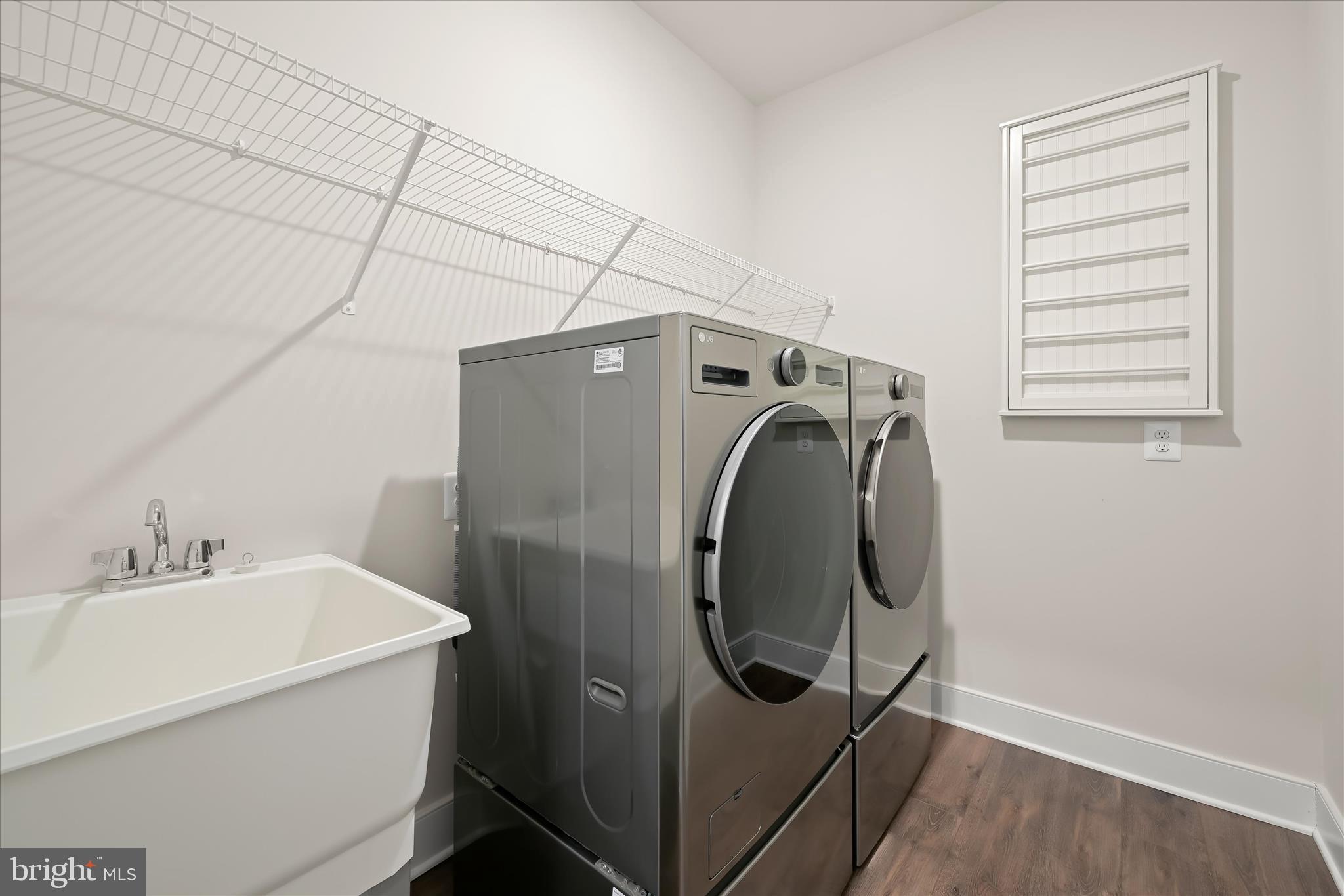 8104 Lisa Lane Fulton, MD 20759 - Photo 23 of 54 a utility room with dryer and washer