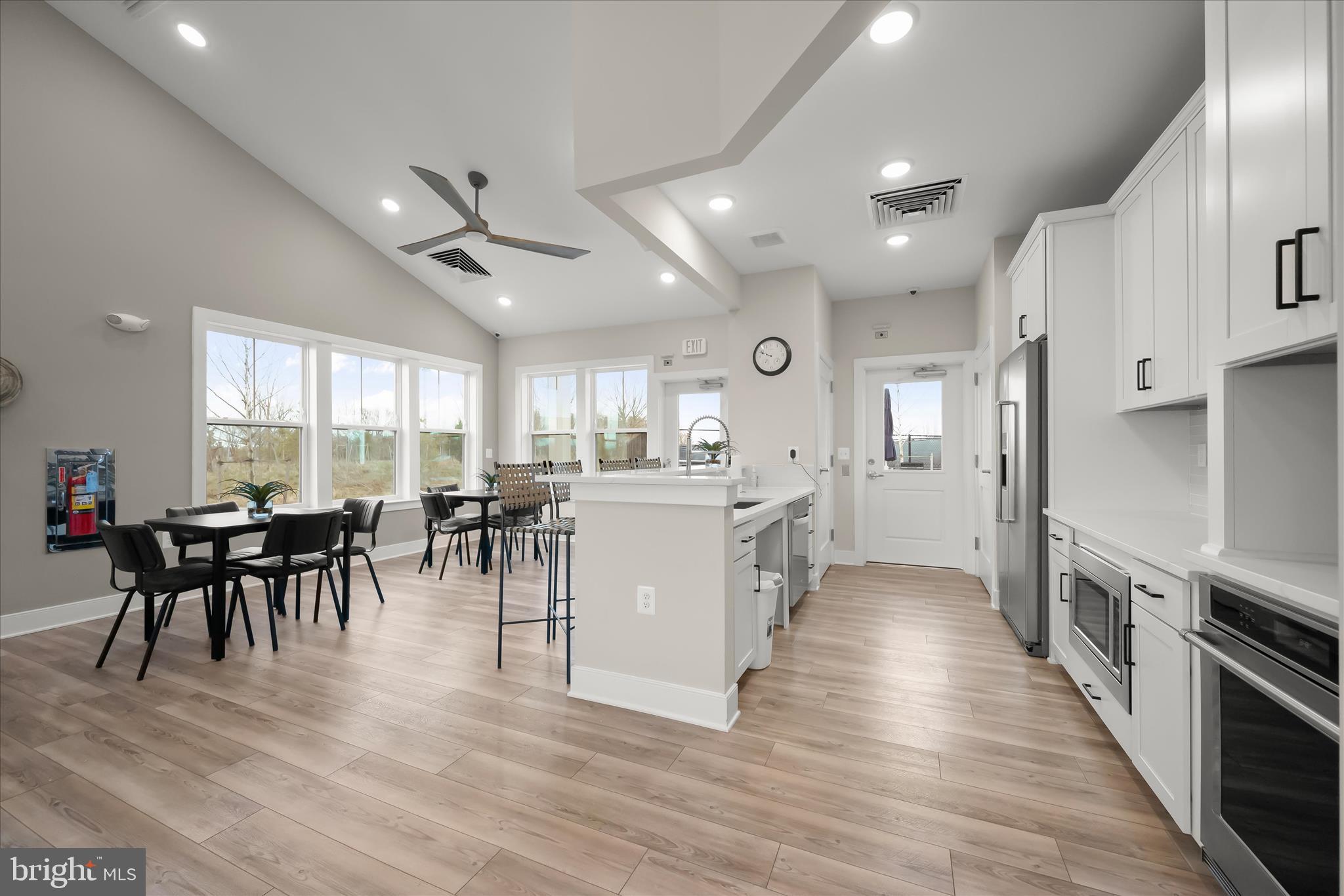 8104 Lisa Lane Fulton, MD 20759 - Photo 45 of 54 a view of a dining room kitchen with furniture and a wooden floor