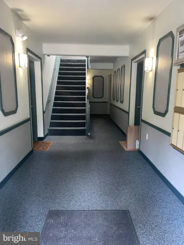 a view of a hallway with entryway