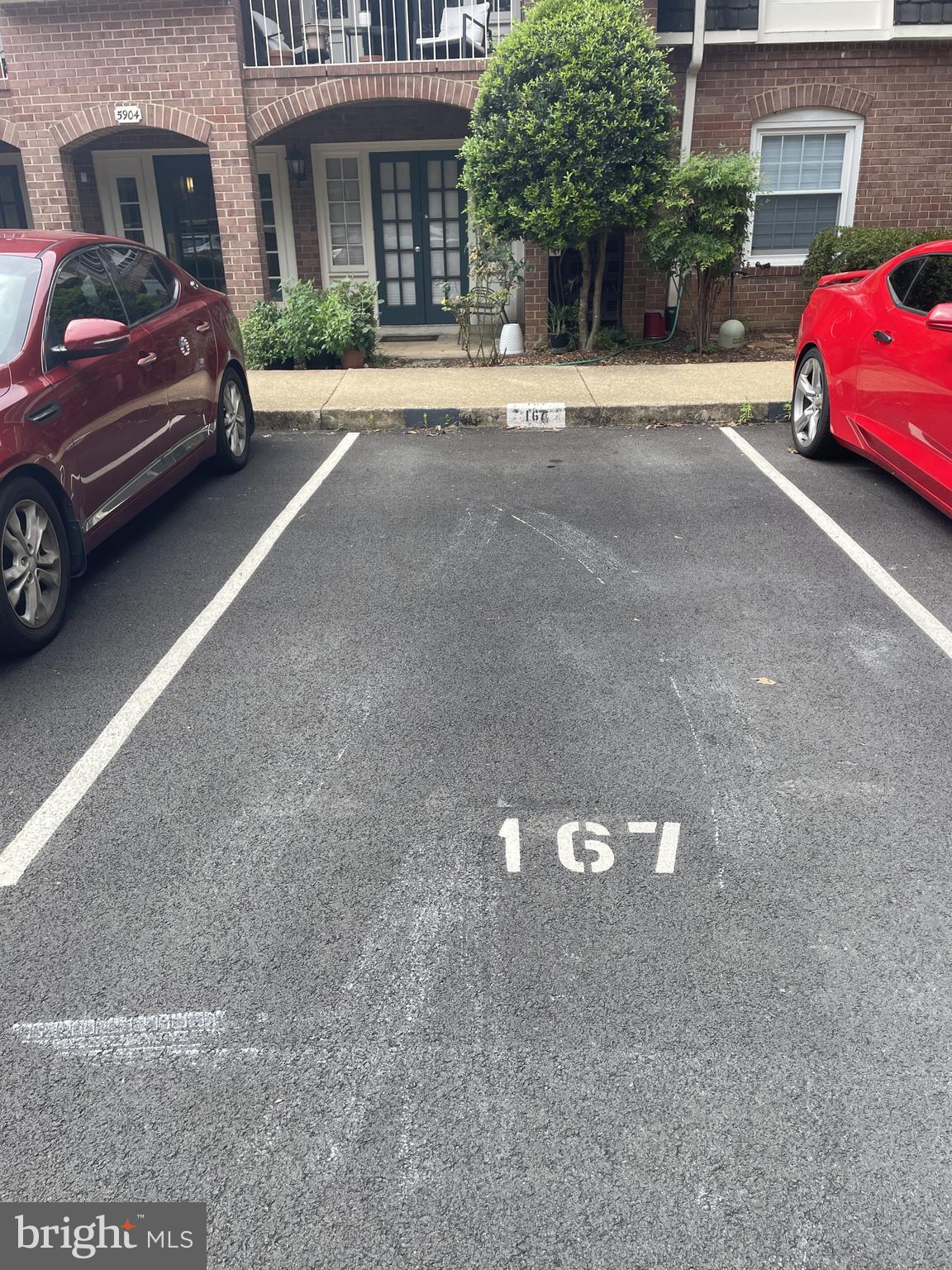5904 L Bayshire Road, Unit L Springfield, VA 22152 - Photo 23 of 40 a view of a car parked in front of a building