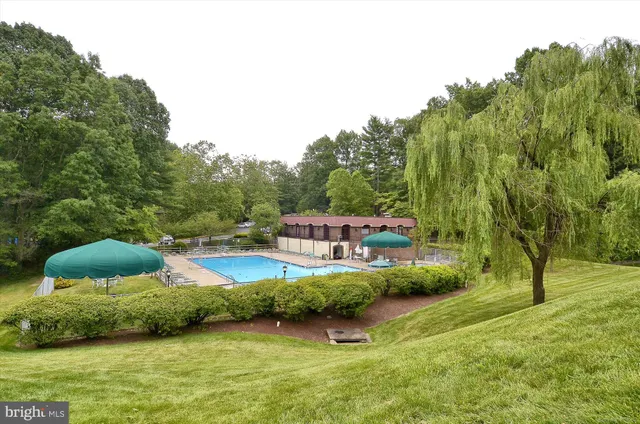 a lobby with furniture and a table