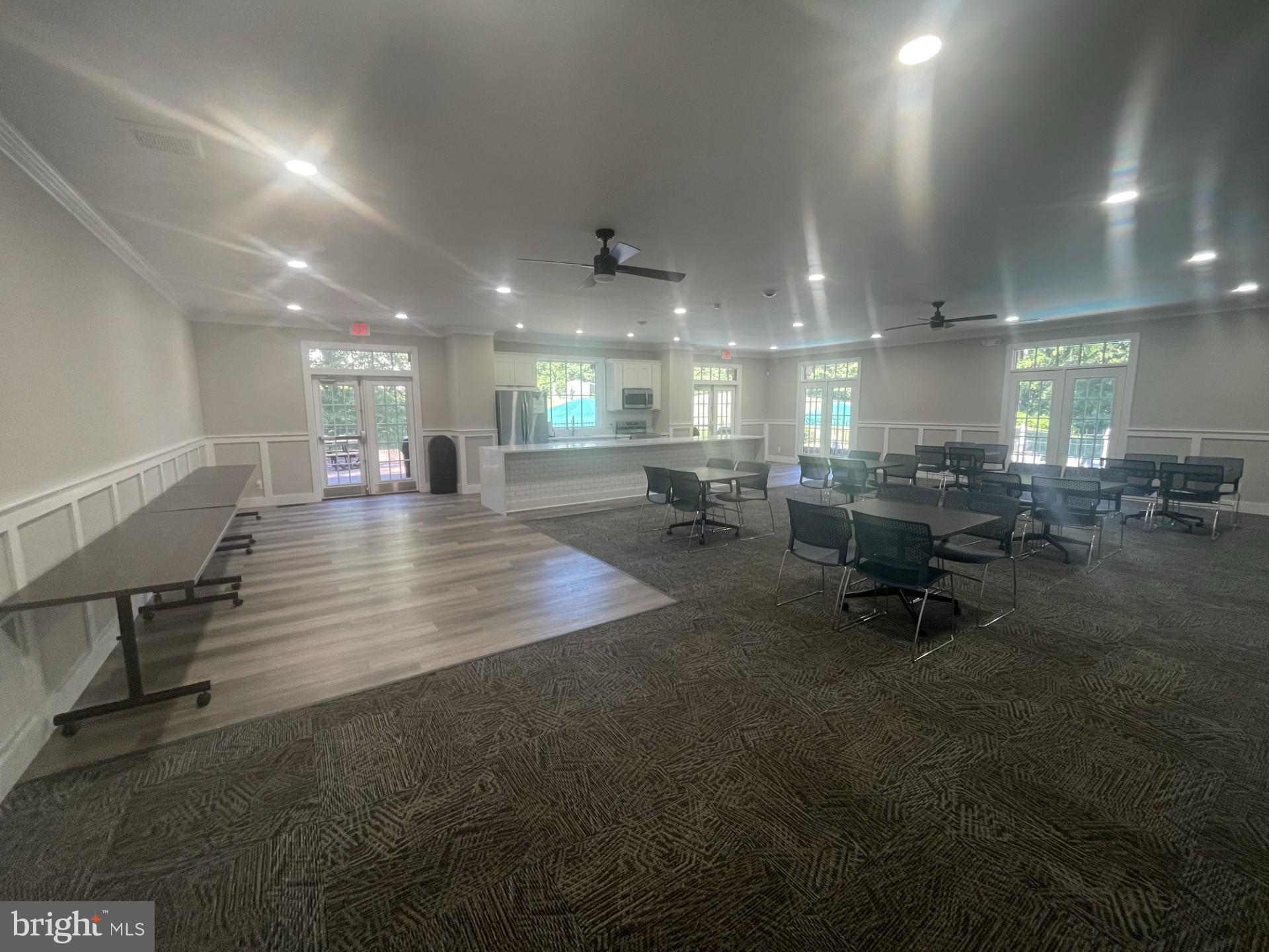 5904 L Bayshire Road, Unit L Springfield, VA 22152 - Photo 33 of 40 a lobby with furniture and a table