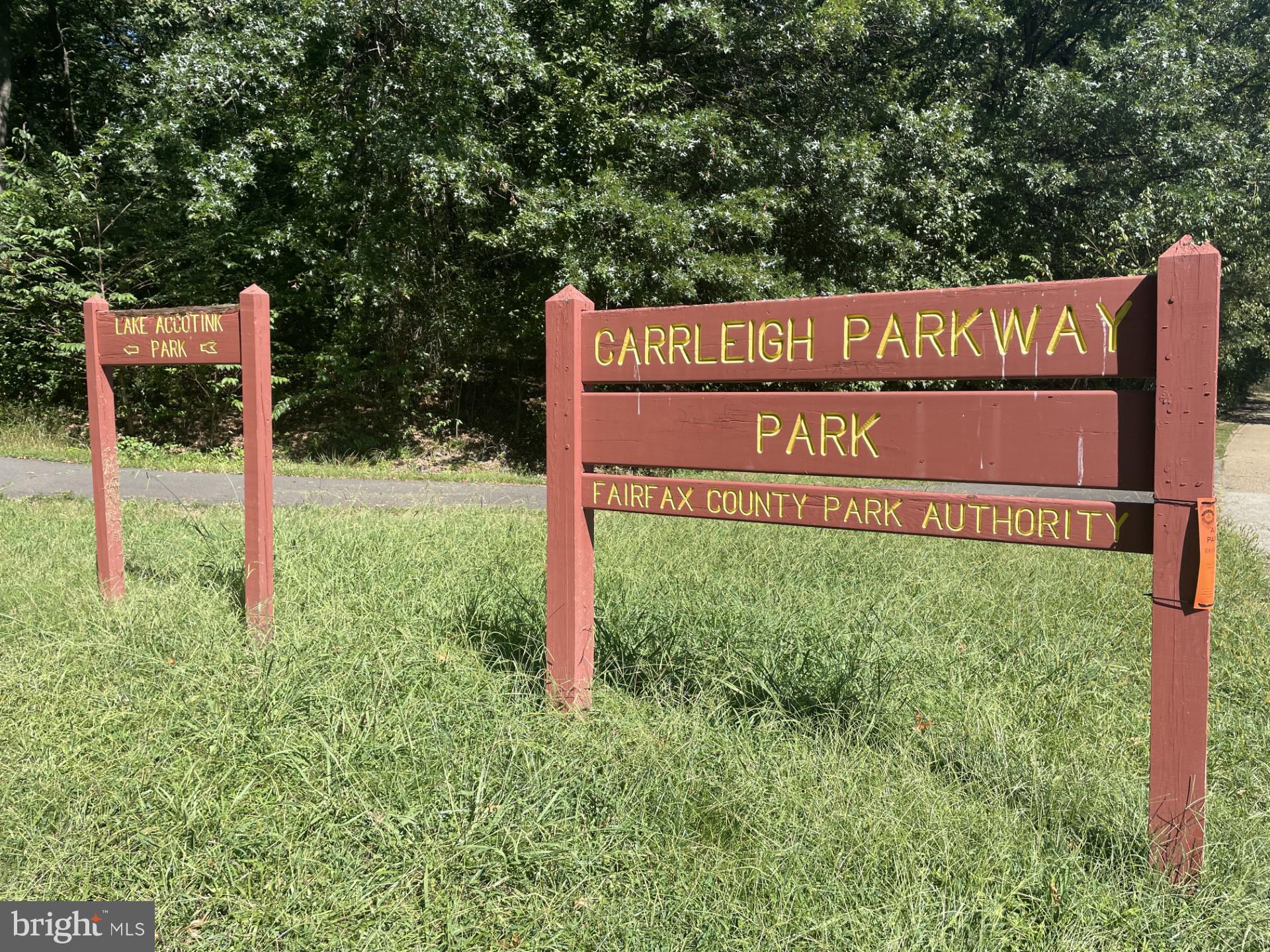 5904 L Bayshire Road, Unit L Springfield, VA 22152 - Photo 40 of 40 a sign that is sitting in front of a tree