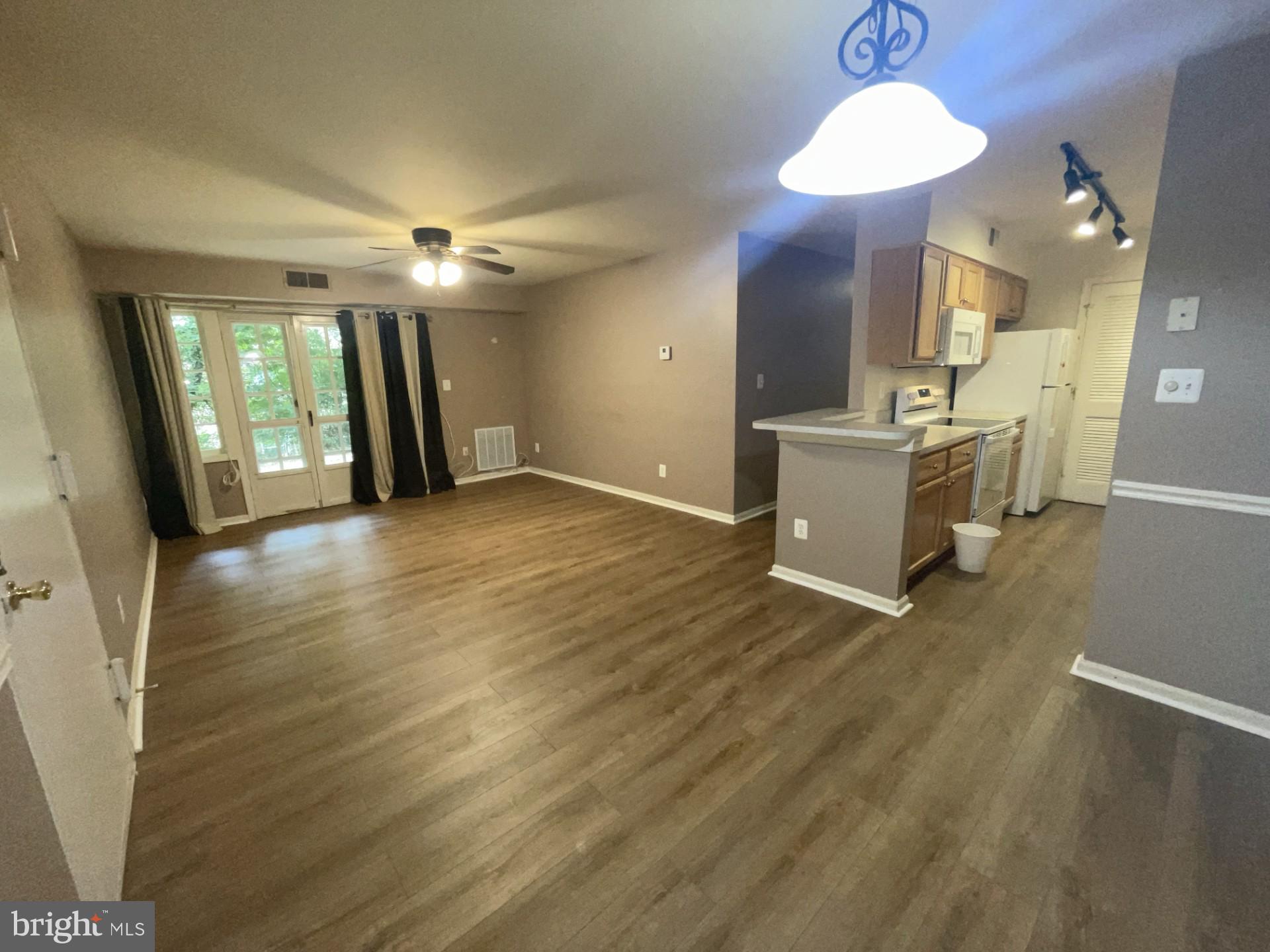 5904 L Bayshire Road, Unit L Springfield, VA 22152 - Photo 4 of 40 a view of a livingroom with a fireplace