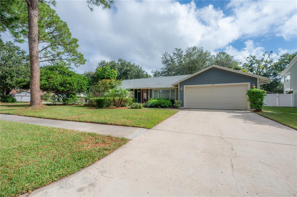 3341 Foxridge Circle Tampa, FL 33618 - Photo 1 of 1 a front view of a house with garden