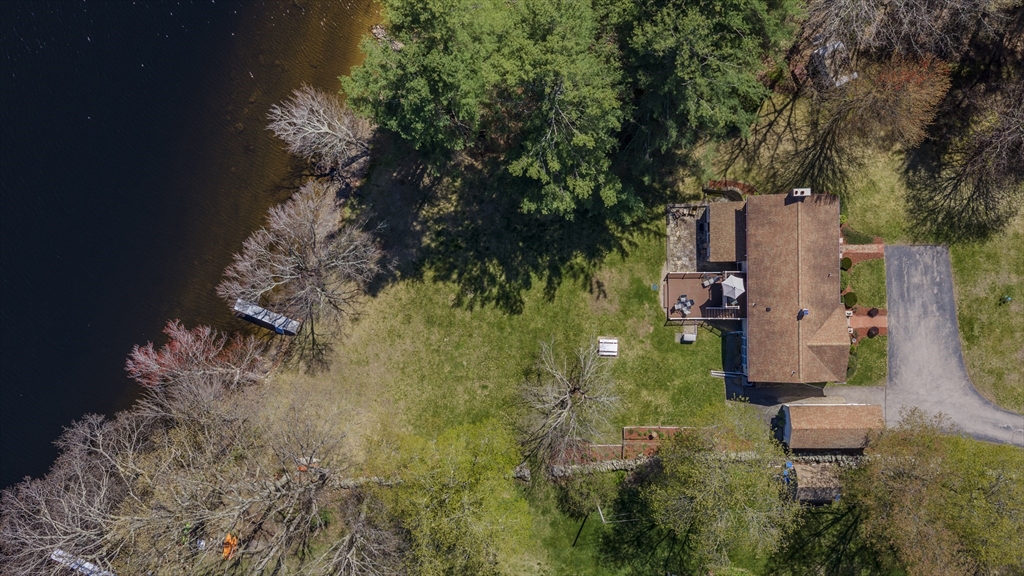 132 Paxton Road Spencer, MA 01562 - Photo 8 of 42 a aerial view of a house with a yard