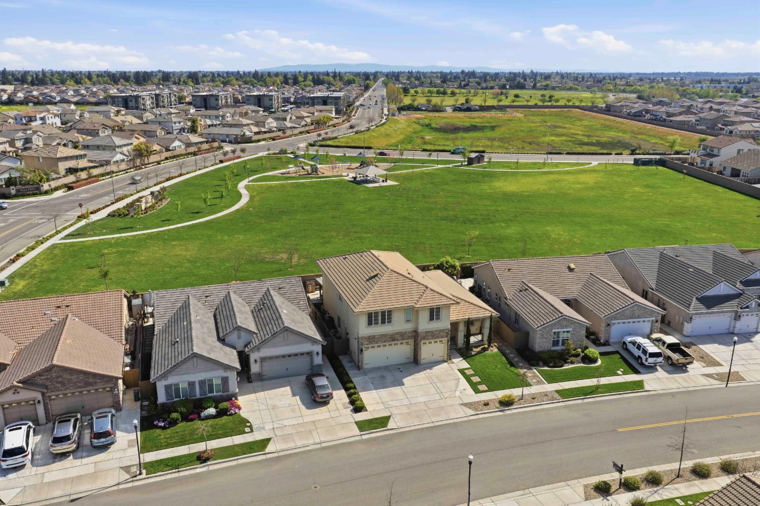 2012 Van Ruiten Drive Lodi, CA 95242 - Photo 43 of 49 an aerial view of a house with a garden and lake view