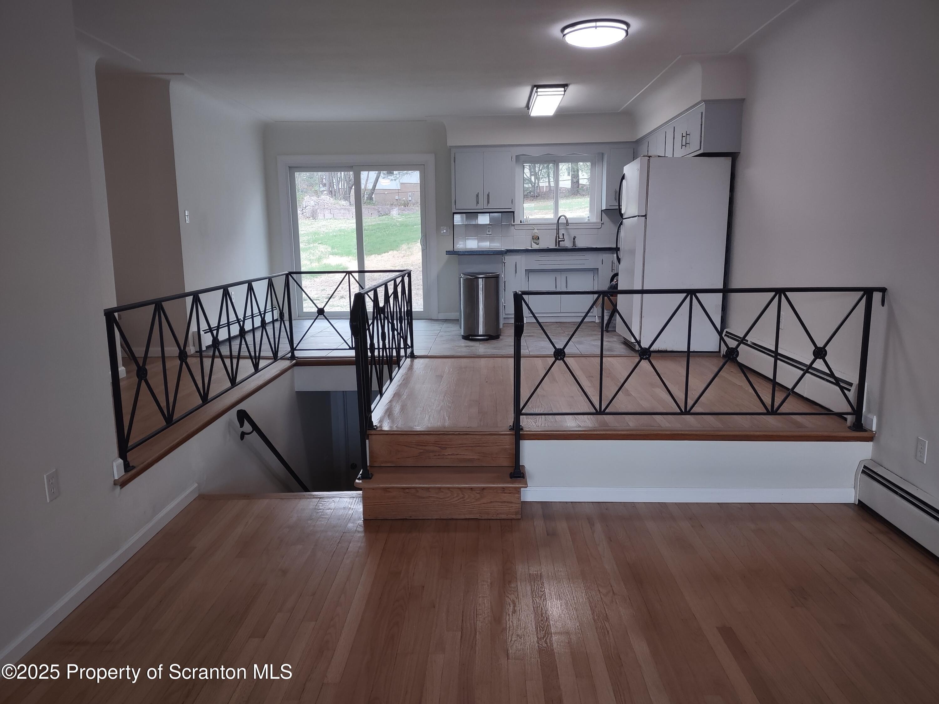 1104 Filbert Street Archbald, PA 18403 - Photo 11 of 39 a living room with a couch and a table