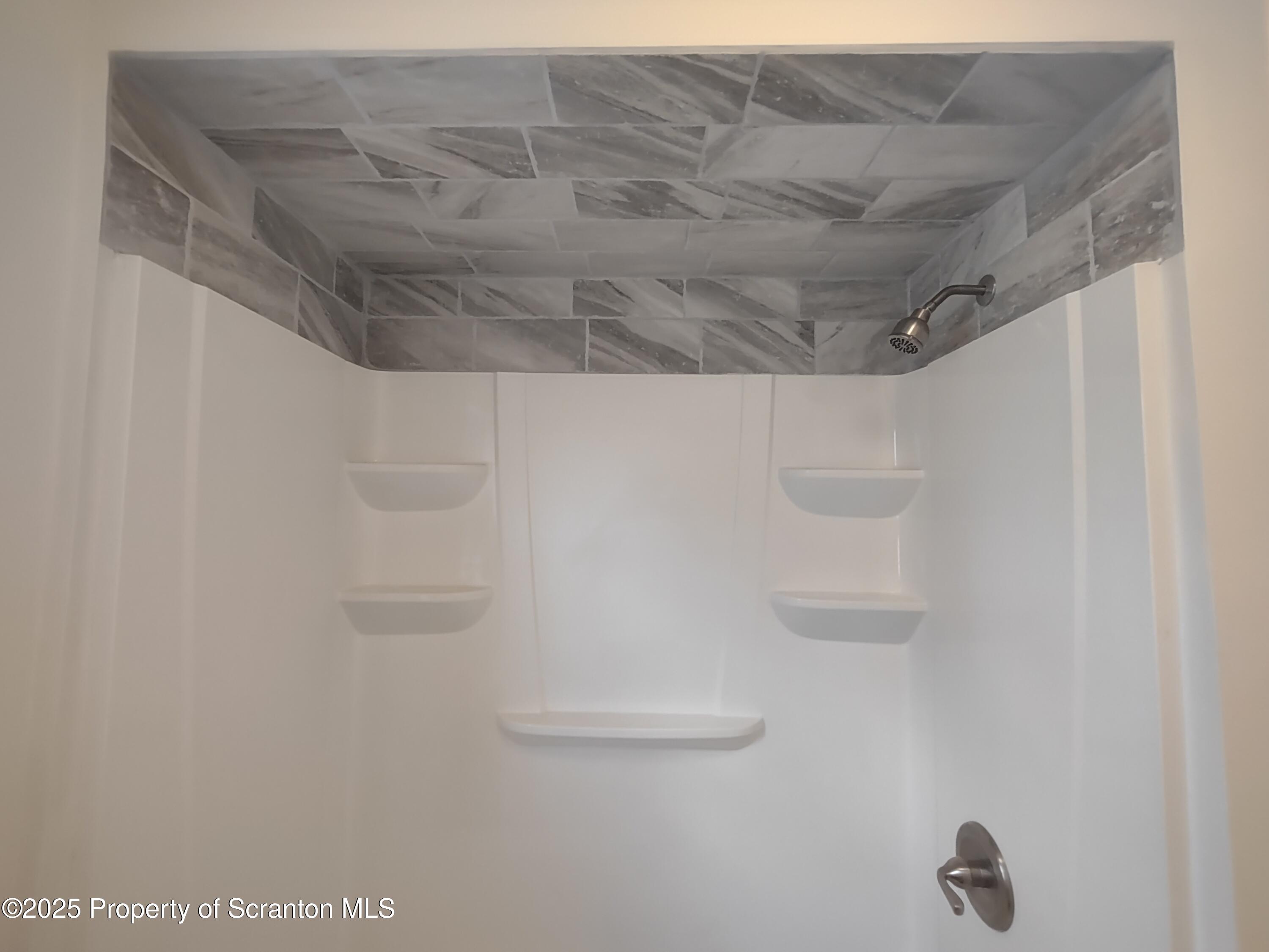 1104 Filbert Street Archbald, PA 18403 - Photo 20 of 39 a bathroom with a shower