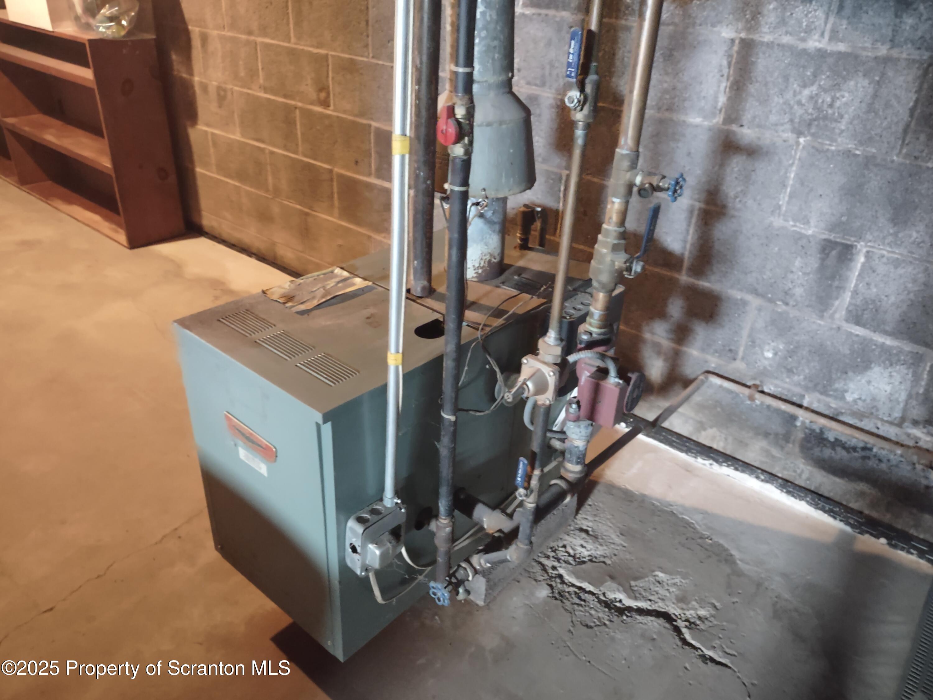 1104 Filbert Street Archbald, PA 18403 - Photo 26 of 39 a utility room with dryer and washer