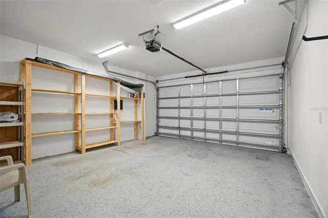 a view of a room with storage and utility room