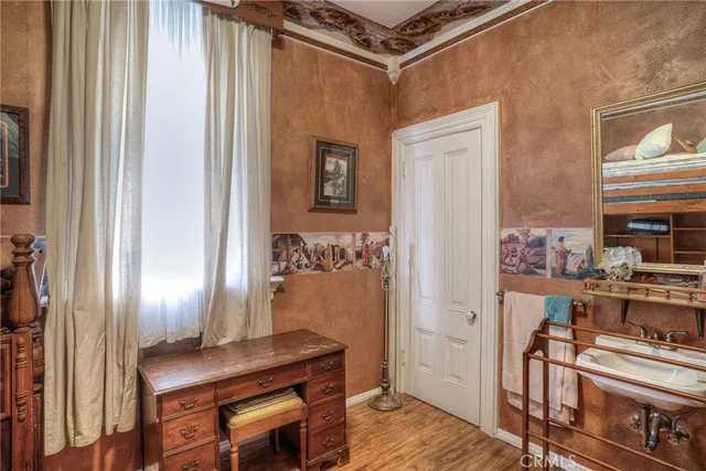 a view of a park with large trees