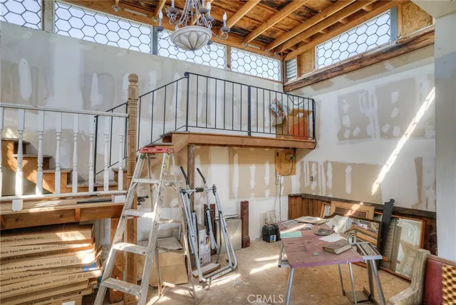 a living room with lots of furniture and a flat screen tv