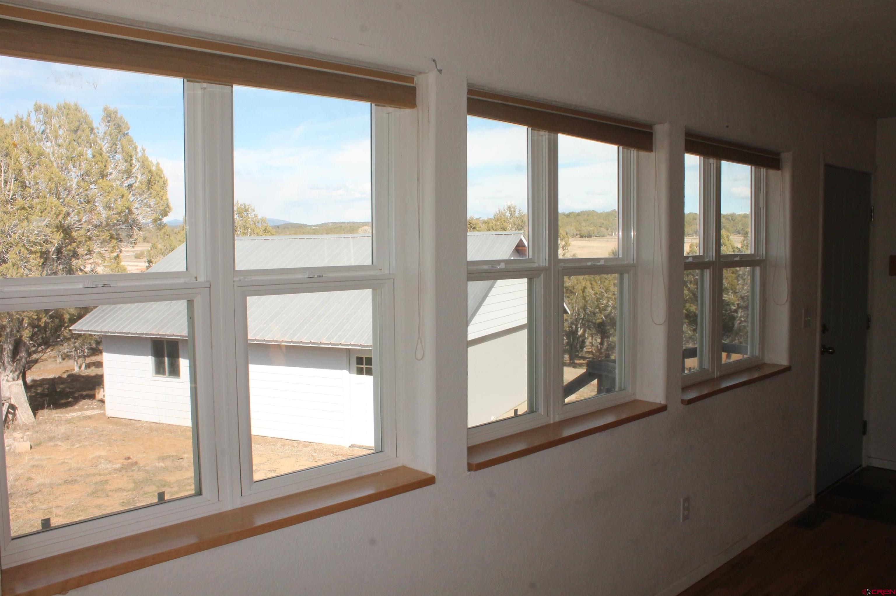 2944 County Road 510 Durango, CO 81303 - Photo 22 of 38 a view of an empty room and window