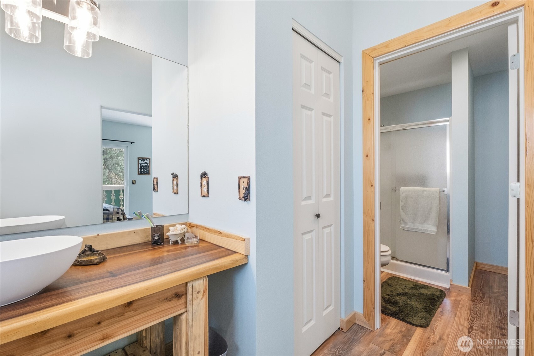8348 Main Street, Unit 1 Peshastin, WA 98847 - Photo 31 of 40 a bathroom with a sink a toilet and shower