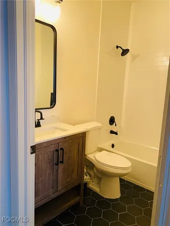 a bathroom with a sink and a toilet