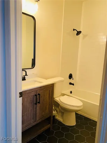 a bathroom with a sink and a toilet