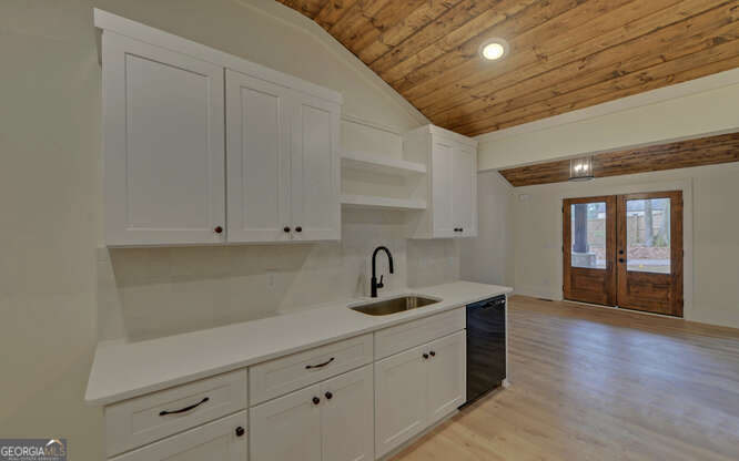 999 East Doyle Street Toccoa, GA 30577 - Photo 14 of 42 a kitchen with sink and cabinets