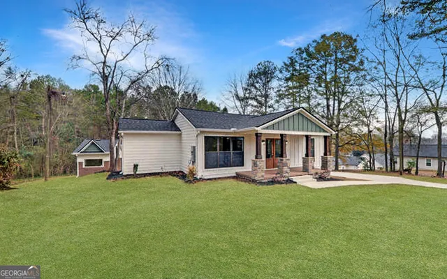 a front view of a house with patio