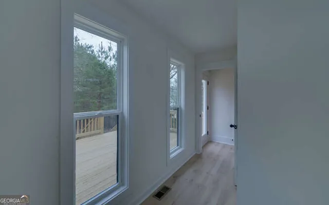 an empty room with windows