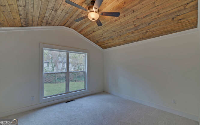 999 East Doyle Street Toccoa, GA 30577 - Photo 27 of 42 an empty room with windows